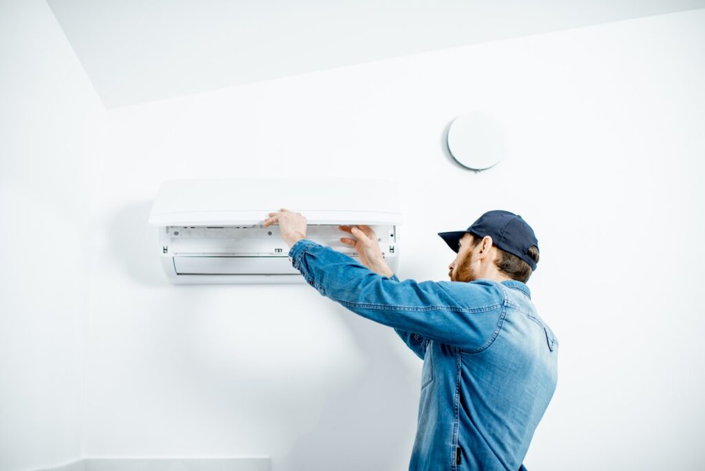 Man serving the air conditioner